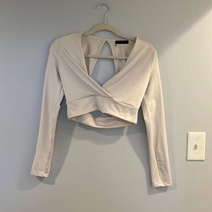 21 saints beige/cream long sleeve v neck shirt with cut out back